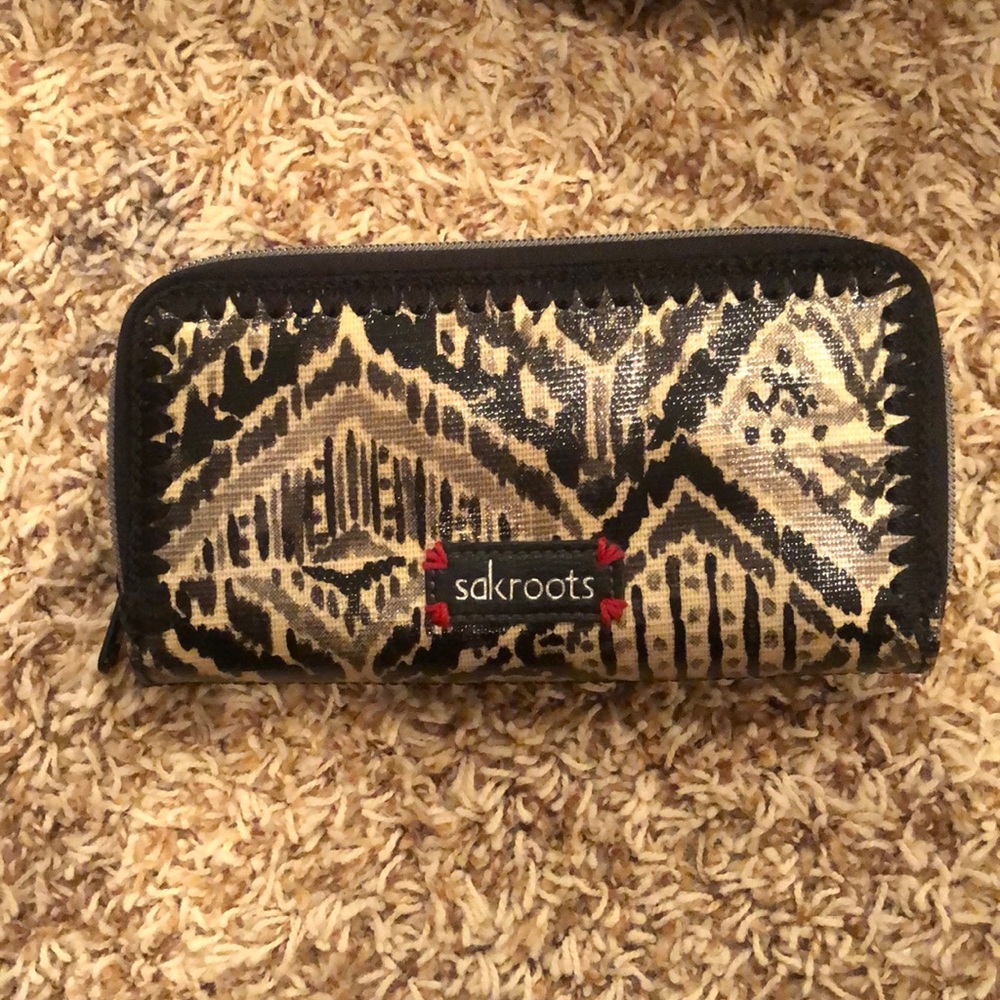 Sakroots bill fold.  Like new black and tan tribal design.